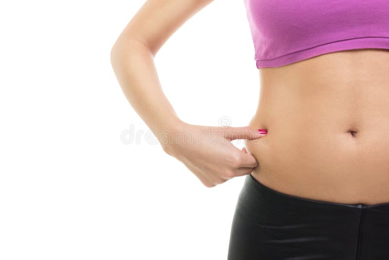 Close up da barriga da mulher com pouca gordura fotografia de stock royalty free Close up da barriga da mulher com pouca gordura fotografia de stock royalty free
