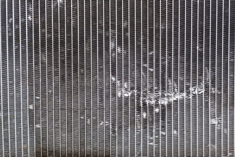 The Damage of Car Cooling Radiator. the Old Radiator of the Damaged Car