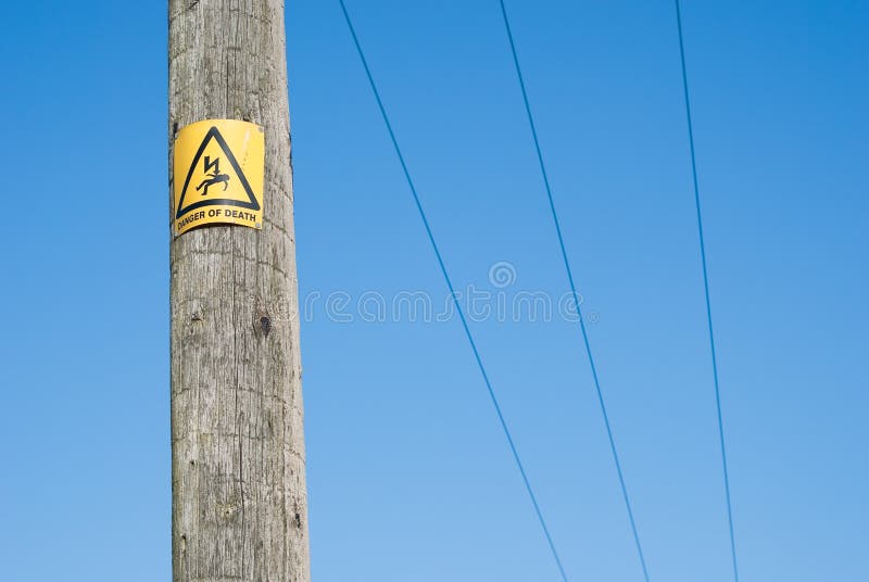 Close up of Danger sign on electricity pole