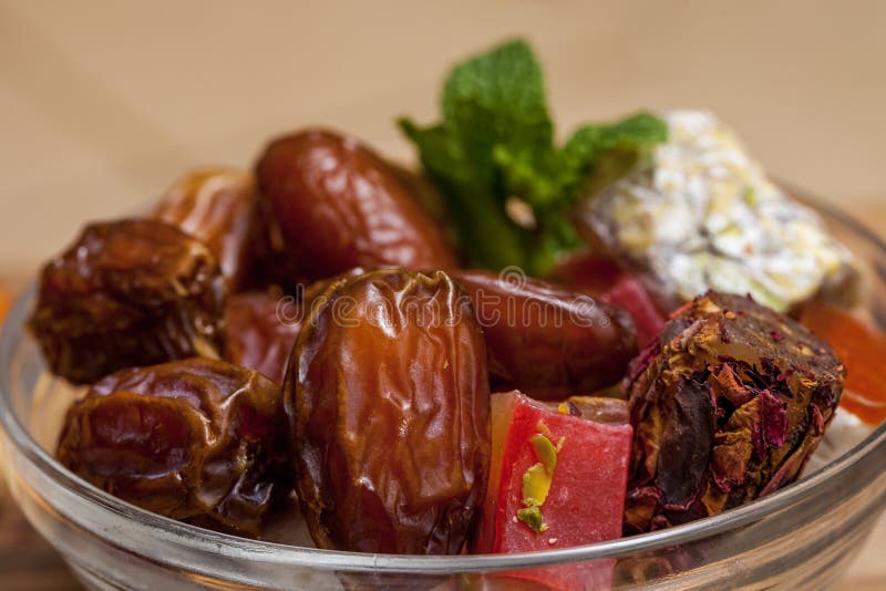 Close Up with Dates and Middle Eastern Desserts with Rose Petals and