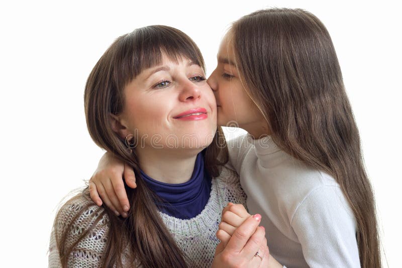 Close Up Of Daughter Kisses Her Mother To The Cheek Stock Image Image