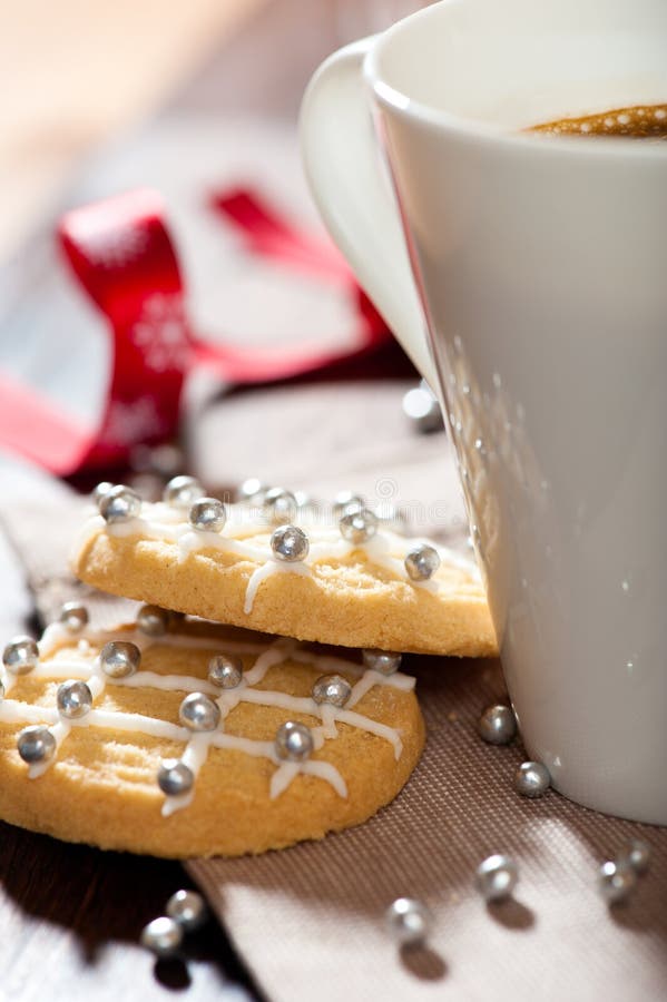 Christmas butter biscuits and a mug of coffee. Christmas butter biscuits and a mug of coffee