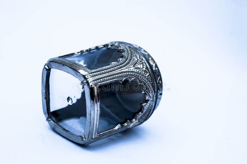 Close Up of Decorative Small Container Isolated on White with Silver