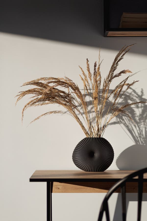 Decorative vase with dried grass