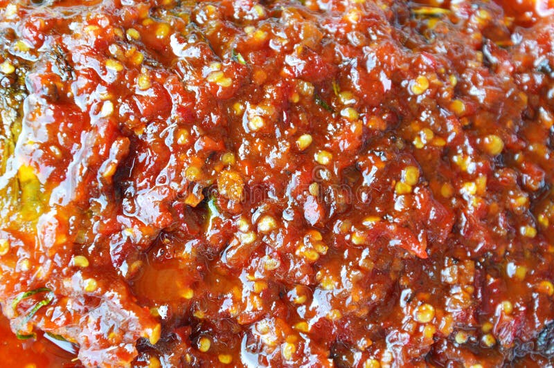 Close Up of Deep Fried Mango Fish Dressing Chili Sauce Texture Stock