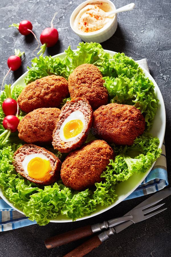 Close-up of Deep Fried Scotch Eggs on a Plate Stock Photo - Image of