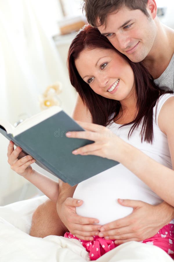 Close-up of a delighted pregnant woman