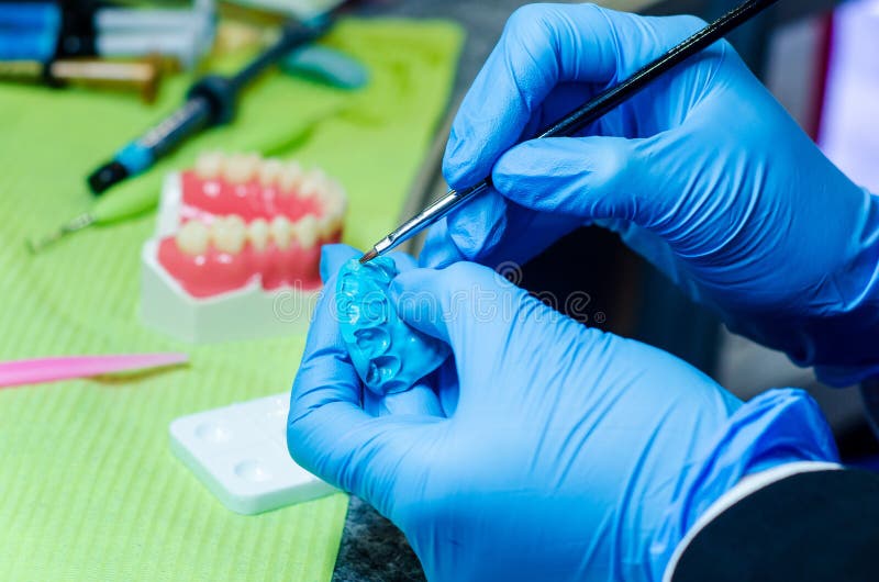 Closeup of Denture Manufacturing Process. Tooth Reconstruction Stock Photo Image of brush