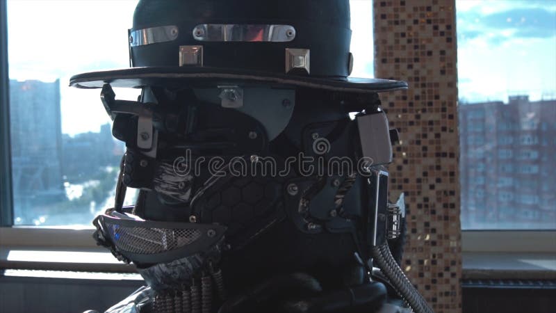 Close-up details of head and shoulders of android. Footage. Details, screws of metal robot man on background of view royalty free stock images