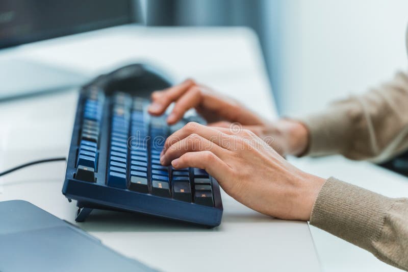 Close up developer hand coding with keyboard on desk at modern office royalty free stock photography