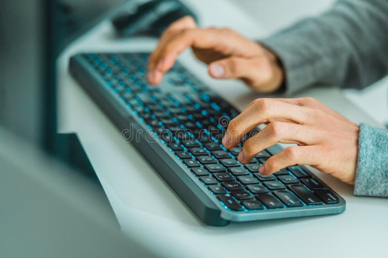 Close up developer hand coding with keyboard on desk at modern office royalty free stock photography