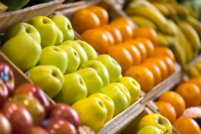 Different types of colorful fresh fruits in health grocery shop. royalty free stock photo