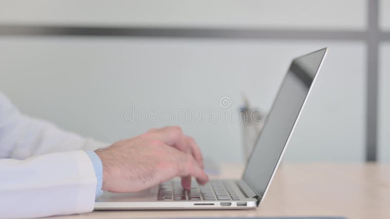 Close Up of Doctor Typing on Laptop stock video
