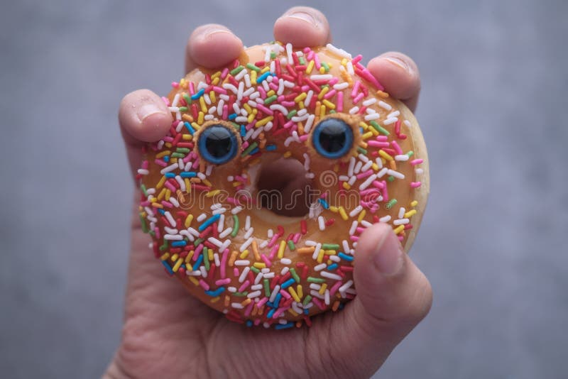 Donut With Funny Smiley Face Stock Image - Image of background, laugh