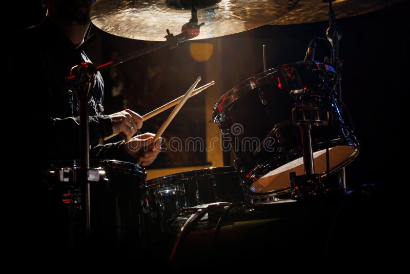 Closeup of Drummer Drumsticks with a Drum Set. Stock Image Image of