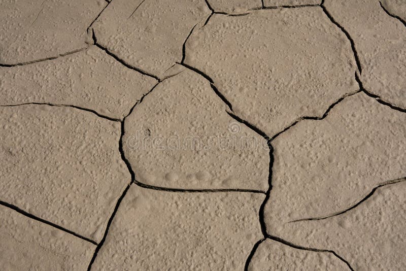 Close up of a dry and cracked riverbed stock photography