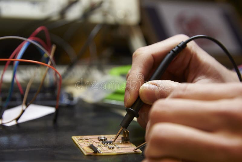 Electrical Engineer Soldering Circuit Board at Work Bench Stock Image Image of workbench, male