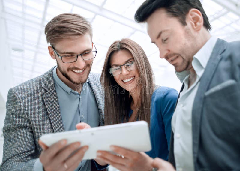 Close up.employees using a digital tablet royalty free stock image Close up.employees using a digital tablet royalty free stock image