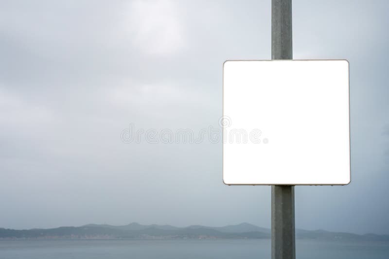 Close up of empty white sign next to the sea royalty free stock images