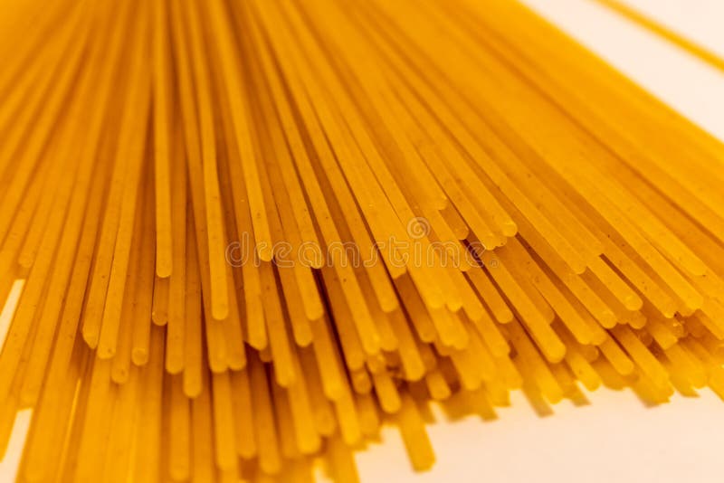 Close-Up Ends of Dry Spaghettini Pasta Noodles