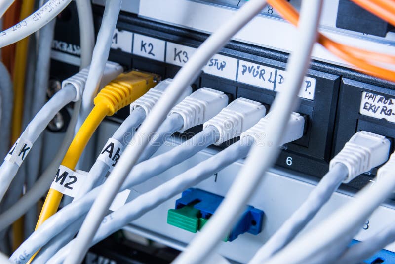 Close-up of ethernet cables and switch stock photo