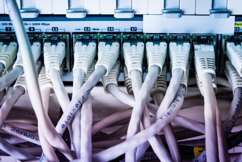 Close-up of ethernet cables and switch stock image