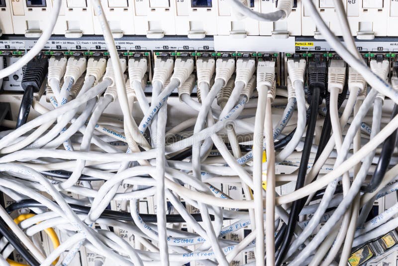 Close-up of ethernet cables and switch stock photo