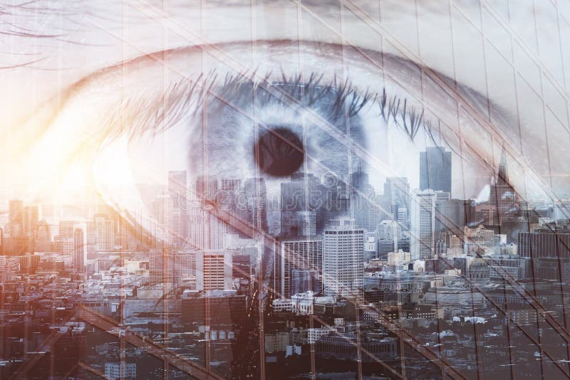 Close up of eye on abstract city background. Future and vision concept. Double exposure