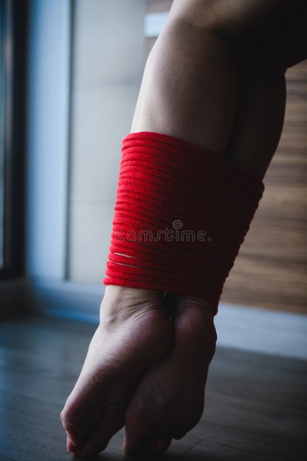 Close Up Of Female Ankles Tied With Red Rope Stock Image Image Of Sensual Sexual 252158061