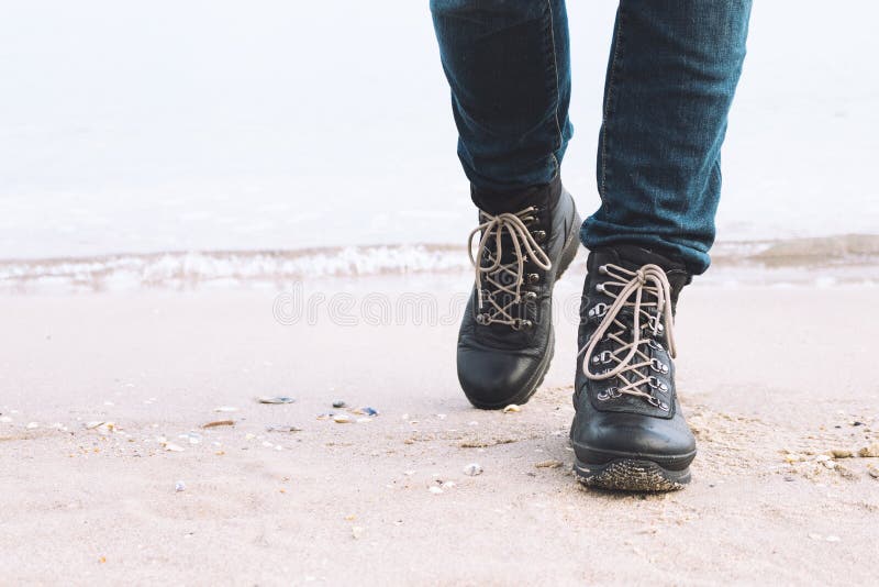 Closeup of Female Legs in the Winter Boots are on the Beach Stock Photo Image of ocean