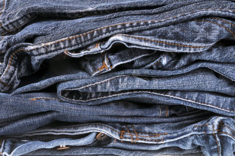 Jeans Folded and Stacked on a White Background Stock Image - Image of ...