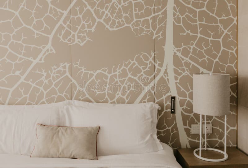 Close up fragment of bedroom with reading lamp in modern home or hotel stock photos Close up fragment of bedroom with reading lamp in modern home or hotel stock photos