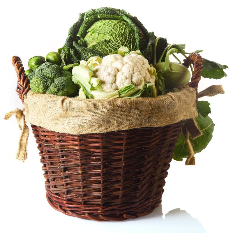 Close up Fresh Farm Vegetables in a Basket, Emphasizing Cauliflower, Brussels Sprouts, Broccoli and Cabbage. Isolated on White Background. Paleo cauliflower stock images, royalty-free photos and pictures