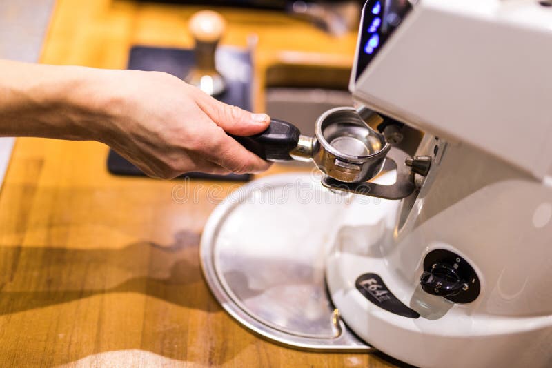 Close Up Freshly Coffee Powder in Coffee Holder from Coffee Maker