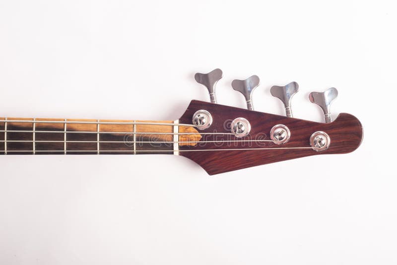 Front view of electric bass guitar headstock royalty free stock photo