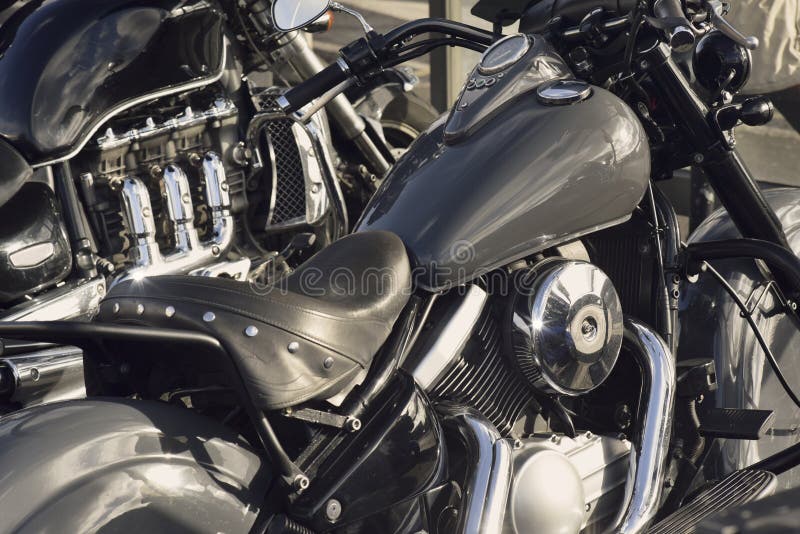 Close up of a motorcycle fuel tank and V twin engine. Close up of a motorcycle fuel tank and V twin engine