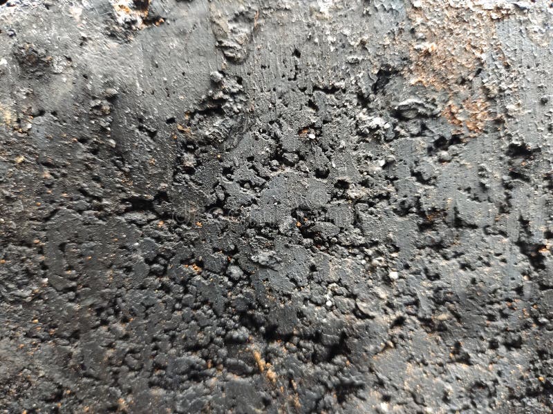 Abstract Gritty Dark Textured Surface Background royalty free stock images