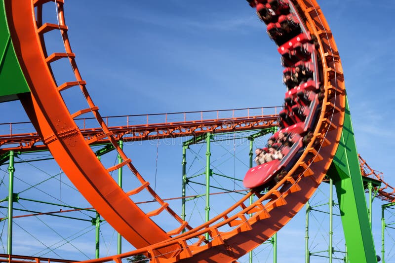 Close-up of a Fun Roller Coaster Ride. Blurred Image of a Train To ...