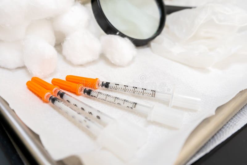 Close Up Shot Of A Pile Of Medical Insulin Needles With Orange Caps Stock  Photo - Download Image Now - iStock