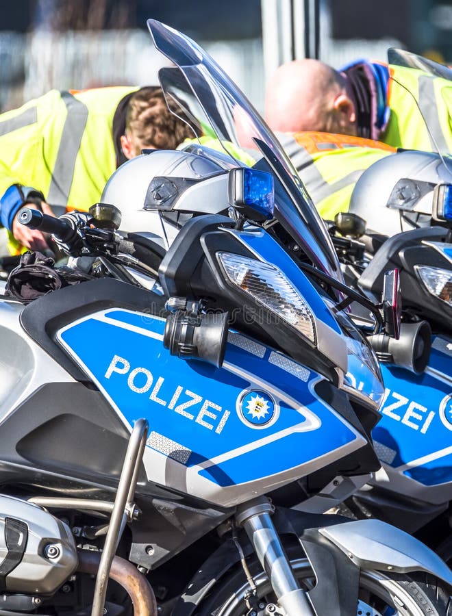 Close-up of German police motor bikes with anonymous police men royalty free stock photo Close-up of German police motor bikes with anonymous police men royalty free stock photo