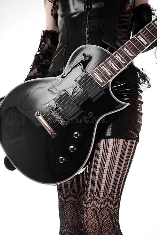Close-up of girl with guitar stock images Close-up of girl with guitar stock images