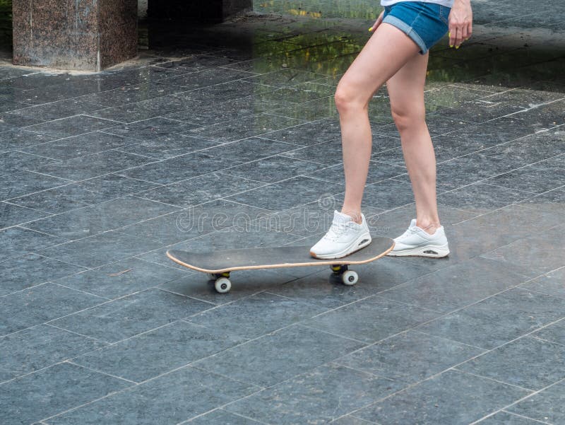 Sunlight over Legs of Person on Skateboard · Free Stock Photo