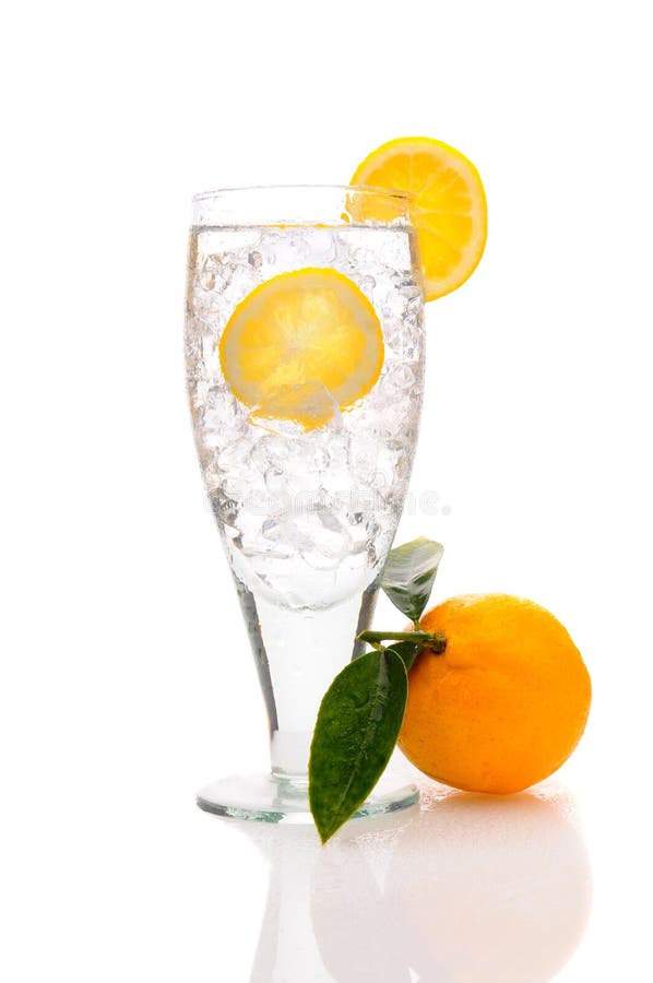 Close up of a glass of Water and Ice with Lemon