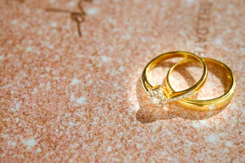 gold wedding rings on a shiny background. AI-Generated 30056444 Stock Photo  at Vecteezy