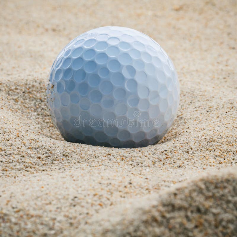 Close Up Golf Ball in Sand Bunker Shallow Depth of Field. a Golf Stock