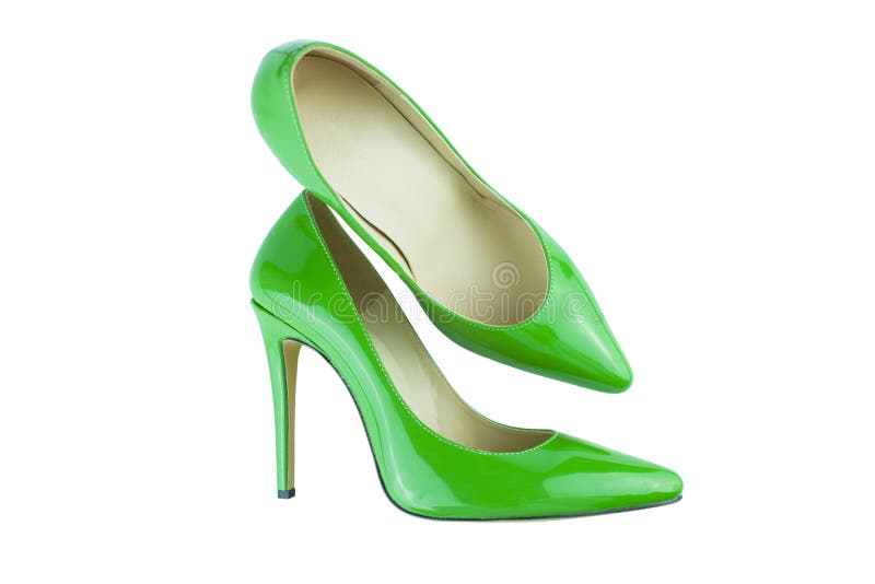 Close up of green high heels on white background.