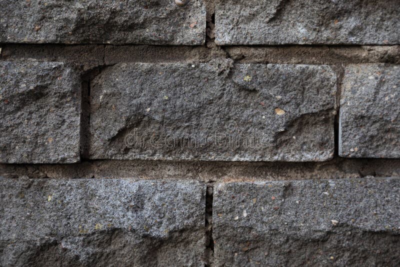 Closeup of Grey Decorative Cobblestone Wall Texture Stock Photo