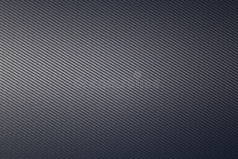 Close Up of Grey Diagonal Oriented Woven Carbon Fibre Sheet Surface