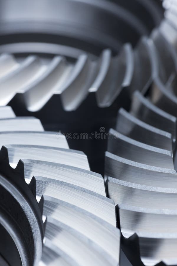 Close-up of grey metallic gear wheels royalty free stock image