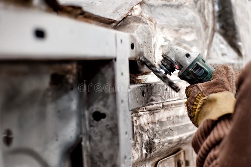 Close-up of grinding machine with auto vehicle engineer stock photos